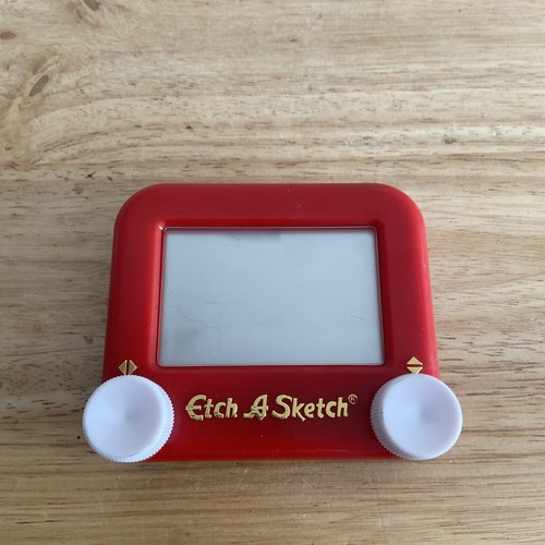 Classic etch sketch pocket - a,