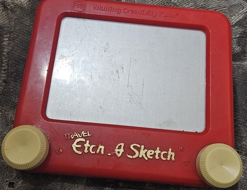 Travel etch sketch making - a, sketch,
